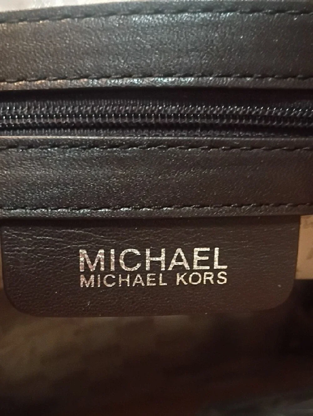 Michael Kors Brown Leather Travel Bag with Silver Hardware